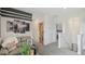 Cozy living space on the second floor, perfect for a den, and offering views of nearby bedrooms and bathroom at 32702 Winterwood Blvd, Wesley Chapel, FL 33543