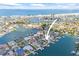 Amazing aerial view of the waterfront property and canal neighborhood near the bay and ocean at 5 Marina Ter, Treasure Island, FL 33706