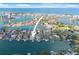 Stunning aerial view of the property and neighborhood homes in a waterfront community at 5 Marina Ter, Treasure Island, FL 33706