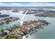 A high angle aerial showing this home's location among other canal front homes at 5 Marina Ter, Treasure Island, FL 33706