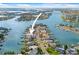 Aerial view showing property location among other homes along a waterfront canal at 5 Marina Ter, Treasure Island, FL 33706