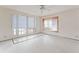 Bedroom with tile floors, a bay window, and French doors leading to the outside at 5 Marina Ter, Treasure Island, FL 33706