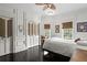 Bedroom with hardwood floors, stylish doors and windows at 5002 S Shore Crest Cir, Tampa, FL 33609