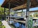 Picture of the boat and boat lift on the water behind the house at 5002 S Shore Crest Cir, Tampa, FL 33609
