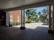 Covered brick driveway and portico provides ample parking and a shaded entrance to the house at 5002 S Shore Crest Cir, Tampa, FL 33609