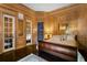 Opulent main bedroom featuring dark wood floors, doors and a built in display at 5002 S Shore Crest Cir, Tampa, FL 33609