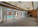 An enclosed patio with columns, brick floor and bar, opens to the large outdoor pool at 5002 S Shore Crest Cir, Tampa, FL 33609