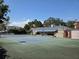 Well-maintained tennis court offers recreation and adds to the property's appeal at 5002 S Shore Crest Cir, Tampa, FL 33609