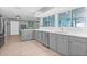 Contemporary kitchen featuring stainless steel appliances, sleek countertops, and ample natural light, ideal for cooking at 5080 43Rd S St, St Petersburg, FL 33711