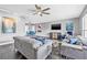 Spacious living room featuring a modern ceiling fan, recessed lighting, and tile floors at 5080 43Rd S St, St Petersburg, FL 33711