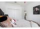 Bright bedroom featuring soft textures, leopard print accents and a minimalist design at 5101 Hartwell Loop, Land O Lakes, FL 34638