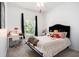 Bedroom with a vanity area and soft, textured bedding at 5101 Hartwell Loop, Land O Lakes, FL 34638