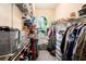 Organized walk-in closet offering ample storage space with shelves and racks, and natural light at 5101 Hartwell Loop, Land O Lakes, FL 34638