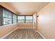 Living room with a waterfront view and wood floors at 5108 Commonwealth Rd, Palmetto, FL 34221