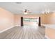 Light and airy living area showcasing beautiful flooring and neutral walls at 5108 Commonwealth Rd, Palmetto, FL 34221