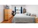 Bedroom featuring hardwood floors and a large window at 5623 80Th N St # 504, St Petersburg, FL 33709