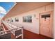 Exterior view of unit 504 with a balcony, neutral paint, and windows allowing for lots of natural light at 5623 80Th N St # 504, St Petersburg, FL 33709
