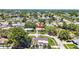 Aerial view of the property surrounded by mature trees in a tropical neighborhood at 5835 29Th N Ave, St Petersburg, FL 33710