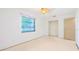 Well-lit bedroom with a large window and a spacious closet at 5835 29Th N Ave, St Petersburg, FL 33710