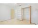 Bedroom with a large closet featuring built in shelves, as well as overhead lighting at 5835 29Th N Ave, St Petersburg, FL 33710