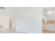 Bright living room featuring neutral paint, with views through to the kitchen and another large room at 5835 29Th N Ave, St Petersburg, FL 33710