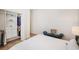 Bedroom with walk-in closet, hardwood floors, and natural light at 6212 Nimes Ct, Lutz, FL 33558