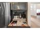 Modern kitchen cabinet with coffee bar and Nespresso machine at 6212 Nimes Ct, Lutz, FL 33558