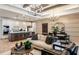 Spacious open-concept living area combining living, dining, and kitchen with high end features and finishes at 6811 Jared Oaks Dr, Wesley Chapel, FL 33545