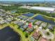 Beautiful aerial view of the home near ponds and community features with easy access to the highway at 6913 Park Strand Dr, Apollo Beach, FL 33572