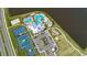 Aerial view of community amenities including pools, tennis courts, basketball court, and playground at 6913 Park Strand Dr, Apollo Beach, FL 33572