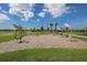 Outdoor fitness area with exercise equipment on a mulch ground cover at 6913 Park Strand Dr, Apollo Beach, FL 33572