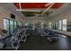 Well-equipped fitness center with treadmills, elliptical machines, and mirrored walls at 6913 Park Strand Dr, Apollo Beach, FL 33572
