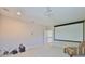 Spacious media room includes projector and screen perfect for entertaining Gathering and friends at 6913 Park Strand Dr, Apollo Beach, FL 33572