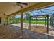 Enjoy water views from this covered and screened patio with a gazebo, perfect for outdoor relaxation and entertaining at 6913 Park Strand Dr, Apollo Beach, FL 33572