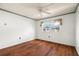 Bedroom featuring wood floors, a ceiling fan, and a window at 7701 Starkey Rd # 504, Seminole, FL 33777