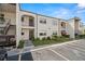 Condominium building with landscaped grounds and parking at 7701 Starkey Rd # 504, Seminole, FL 33777