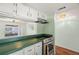 A convenient kitchen pass-through enhances the connection to the living area at 7701 Starkey Rd # 504, Seminole, FL 33777