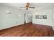 The living room boasts hardwood flooring and a convenient passthrough to the kitchen at 7701 Starkey Rd # 504, Seminole, FL 33777