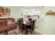 Dining area open to the kitchen featuring tile flooring and comfortable seating at 7701 Starkey Rd # 601, Seminole, FL 33777