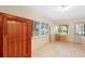 Bedroom with tile flooring, large windows, and natural light at 8350 40Th N Ave, St Petersburg, FL 33709