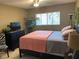 Inviting bedroom with cozy bedding, modern decor, and plenty of natural light at 8455 112Th St # 212, Seminole, FL 33772