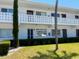 Charming condo building with well-maintained landscaping and freshly painted exterior at 8455 112Th St # 212, Seminole, FL 33772