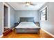 Comfortable bedroom with a well-sized window and ceiling fan provides a warm and inviting atmosphere at 9802 N Oregon Ave, Tampa, FL 33612