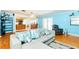 Bright living room with hardwood floors and an open floor plan at 9802 N Oregon Ave, Tampa, FL 33612