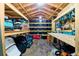 Well-organized storage shed with workbench and shelves, perfect for tools and equipment at 9802 N Oregon Ave, Tampa, FL 33612