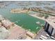 Stunning aerial view of the property showcasing its waterfront location, marina, and proximity to surrounding neighborhoods at 10379 Paradise Blvd # 40, Treasure Island, FL 33706