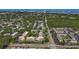 Expansive aerial view showcases an apartment community close to the intercoastal waters and surrounding landscapes at 12900 Vonn Rd # D202, Largo, FL 33774