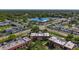 Scenic aerial view of apartments close to a shopping area, showcasing easy access to amenities at 12900 Vonn Rd # D202, Largo, FL 33774