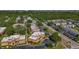 Aerial shot of the condo community, showcasing well-maintained buildings and easy access to nearby roads at 12900 Vonn Rd # D202, Largo, FL 33774