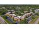 A charming condo community featuring lush landscaping and ample parking at 12900 Vonn Rd # D202, Largo, FL 33774